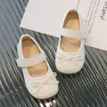 Zapatos Mary Jane blancos acolchados para niña con lazo elegante y cierre de velcro - EU 21 / Blanco