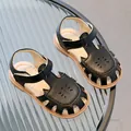 Girls' black hollow-out closed-toe sandals with floral laser-cut patterns and soft sole - EU 21 / Black
