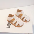 Cream white closed-toe toddler sandals with cross-strap design and hook-and-loop closure - 16 / White