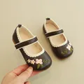 Brown Mary Jane shoes for girls with floral embroidery and white wavy edge trim - EU 21 / Dark Brown
