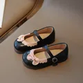 Mädchen Mary Janes in Schwarz mit rosa Schleifen und Wellenrand auf braunem Leder - 21 / Schwarz