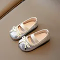 Sparkly silver sequin Mary Jane flats for girls with a decorative white bow and strap - EU 21 / Silver