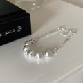 Elegant double-strand silver beaded bracelet featuring five matte finished round beads - Silver