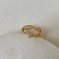 Detailed view of adjustable golden butterfly ring with sparkling zircon stones - Pave Zirconia Bow Ring (Style 5)