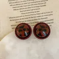 Macro detail of vintage leopard print resin earrings with dark red twisted rope borders - 925 Silver Earring Post / Style 1 Hemisphere Reddish Brown Leopard