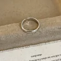 Close-up of polished silver geometric irregular ring showing minimalist adjustable design - Open Design / Silver Smooth Open Ring