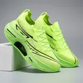 Detail view of fluorescent green knitted running shoes with cushioning midsoles and breathable mesh - EU 36 / Fluorescent Green