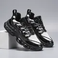 Close-up of mesh fabric and Retro Trend logo on black and white chunky sneakers - EU 40 / White Black