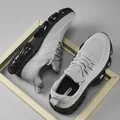Classic grey mesh running sneakers with thick black shock-absorbing soles for active men - EU 40 / Gray