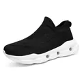 Lightweight black flyknit walking shoe with white cushioned hollow out sole for casual wear - 35 / Black and White