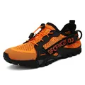 Men's breathable hiking shoes in vibrant orange and black with quick-lace system - 36 / Orange