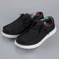 Detalle de mocasines de lona negra con forro estampado y suela de goma blanca - EU 40 / Negro