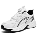 White casual athletic sneakers with black accents and rotary buckle lacing system - 36 / White