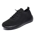 All-black flyknit running shoes with lightweight cushioned soles and breathable mesh - 35 / All Black