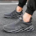 Dark grey breathable knit running sneakers with modern wavy hollow out sole for men - EU 38 / Gray