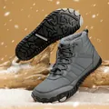 Close-up of gray high-top winter boots featuring warm fur lining and elastic toggle laces - EU 36 / Gray
