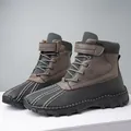 Detailansicht der wasserdichten High-Top-Schneestiefel mit robuster Gummisohle - 38 / Grau Mit Fleece (3020)