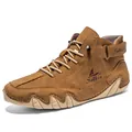 Brown high-top leather boots with octopus stitching and durable rubber sole - Tan