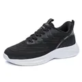 Men's lightweight breathable mesh running shoes in black and white with JGAK logo - 39 / Black