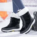 Black lace-up snow boots for women with thick white faux fur trim and non-slip platform - EU 36 / Black