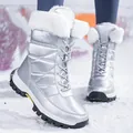 Metallic silver waterproof snow boots with white faux fur lining and lace-up design - EU 36 / Silver