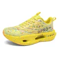 AVRROAS 9 PRO bright yellow running shoes with artistic splatter design and carbon plate - 34 / Golden Python