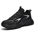 Men's chunky black sports sneakers with thick shock-absorbing sole and silver geometric pattern - 40 / Black and Gray