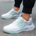 Zapatillas de running para hombre en blanco y verde menta con suela hueca amortiguada - Verde Grisáceo