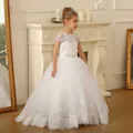 Macro detail of multi-layer mesh tulle hem and intricate lace embroidery on girl's gown - 2-3Y / All Beige