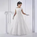 Close-up of intricate white embroidery and delicate bow on flower girl dress bodice - 8-9 Years / White