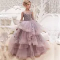 Close-up of elegant kids party dress featuring delicate mesh layers and 3D floral details - 8-9 Years / Lotus root pink