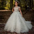 White sleeveless lace girl's wedding dress with layered tulle train and gemstone belt - 4-5 / T-Shirts