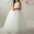 White sleeveless flower girl dress with pearl neckline and layered fluffy tulle skirt - Size 2 / Ivory