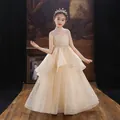 Elegant champagne flower girl dress with sequins and high neck for wedding performance - 110cm / Champagne Sleeveless