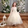 Detailed embroidery on a champagne girls princess dress with layered tulle and satin bow - Champagne / US4