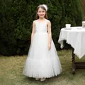 Close-up of the delicate lace bodice and multi-layered tulle on the white flower girl dress - White / 2-3Y
