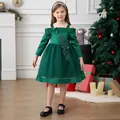 Detail of dark green Christmas dress featuring lace floral embroidery and bow strap - XXS / Dark Green