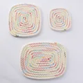 Close-up of white woven cotton coasters featuring colorful rainbow zigzag embroidery details - 20x15cm / Warm Multi-color