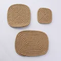 Detailed macro view of handcrafted square jute coasters with spiral woven texture - 20x15cm / Khaki