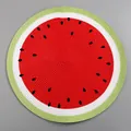 Top view of a round woven watermelon placemat with red pulp and green rind design - Round Diameter 38cm / Watermelon