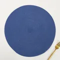 Detail of round blue woven placemat with textured ramie cotton and a gold fork accent - Plain Blue