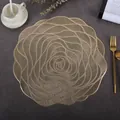 Macro detail of golden circular hollow placemat with elegant spiral floral pattern - Rose Flower (Gold)