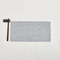 Detail of woven table mat with blue and white geometric triangle patterns - White + Dark Grey