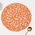Handwoven round orange table mat made of paper rope with textured irregular weave pattern - Round / Orange