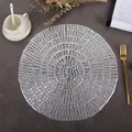 Modern silver circular hollowed-out PVC placemat with elegant radial woven texture for dining - Grid Flower (Silver)