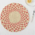 Handwoven round table mat with red and beige spiral patterns and tassel accents - Sawtooth Red Two-Tone