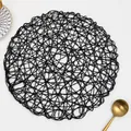 Handwoven round black table mat with decorative mesh texture and golden spoon - Round / Solid Black