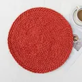 Handwoven round paper rope table mat in brick red color for heat insulation - Red