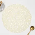 Handwoven cream round placemat with textured fiber pattern and wavy edge detail - Round / Milky White