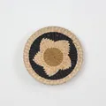 Handwoven wall hanging tray with black starburst pattern and bohemian natural fibers - A14